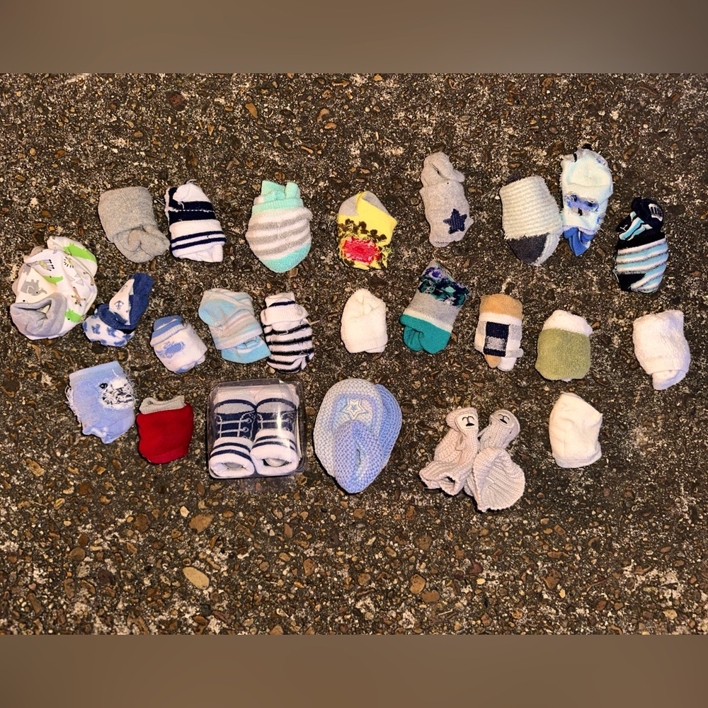 26 pairs of baby boy socks.